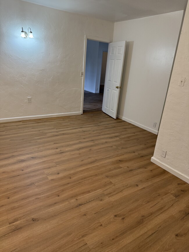 Door entrance to third bedroom - 112 E 69th Way Apartments Unit 112