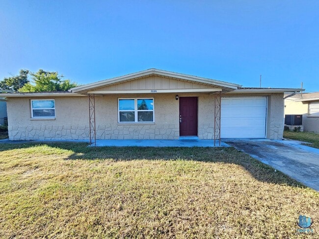 Building Photo - Charming 2-bed, 1-bath home in Holiday, FL...