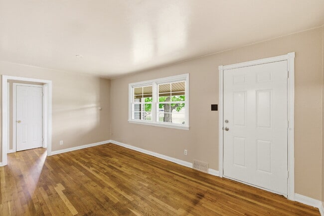 Photo - Four Bedroom Home In Aurora - ready ASAP. Brand New Paint Top to Bottom, with updated flooring!