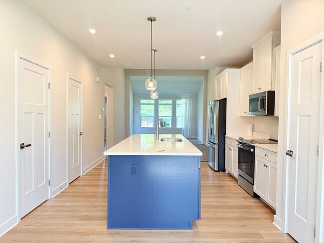 Photo - Coastal Luxury Living in River Run – Minut...