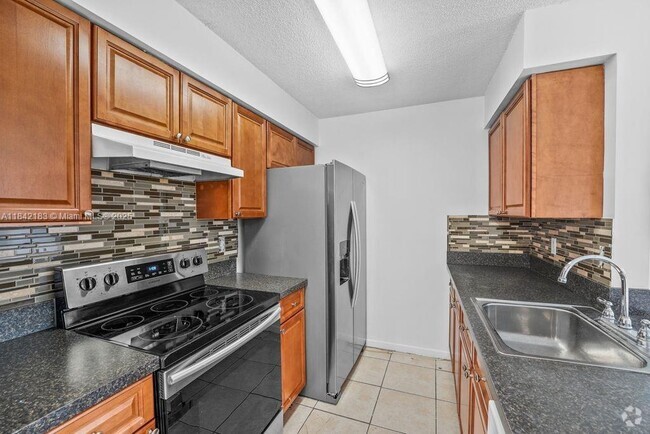 Building Photo - 10461 NW 7th St Unit 204 Rental