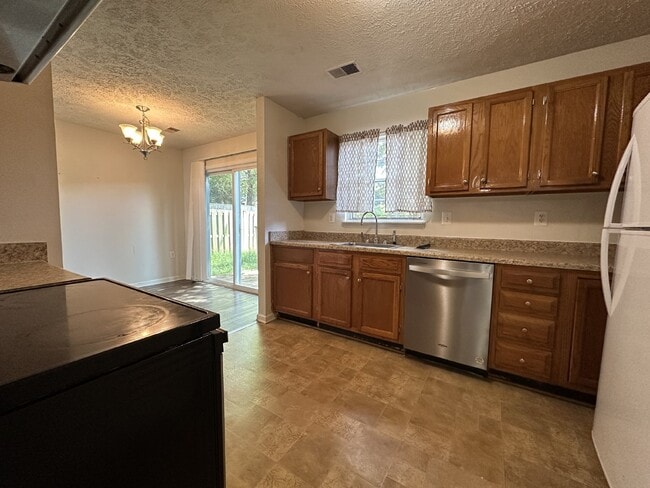 Photo - This end unit townhome offers convenience and comfort, situated close to Manassas Park.