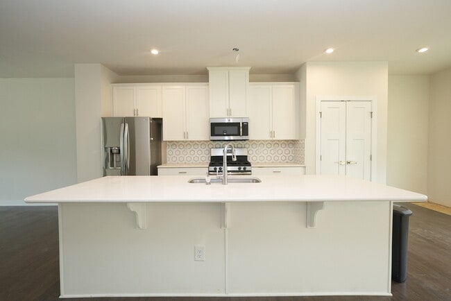 Photo - Three story town home with 2 car garage