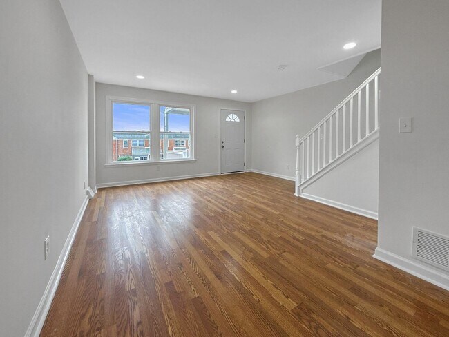 Photo - Spacious 3BR Home with Finished Basement & Flex Space