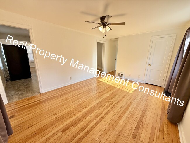 Photo - Charming 3-Bedroom Home with Covered Deck ...