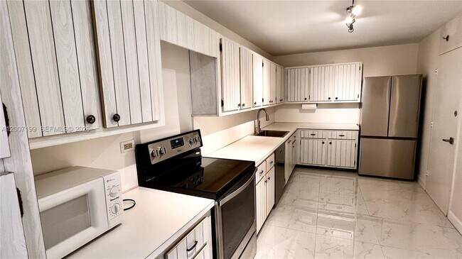 Photo - 6039 Collins Ave Unit 520