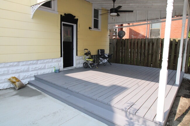 Private covered patio leads to ground level patio. - 432 Southview Ave