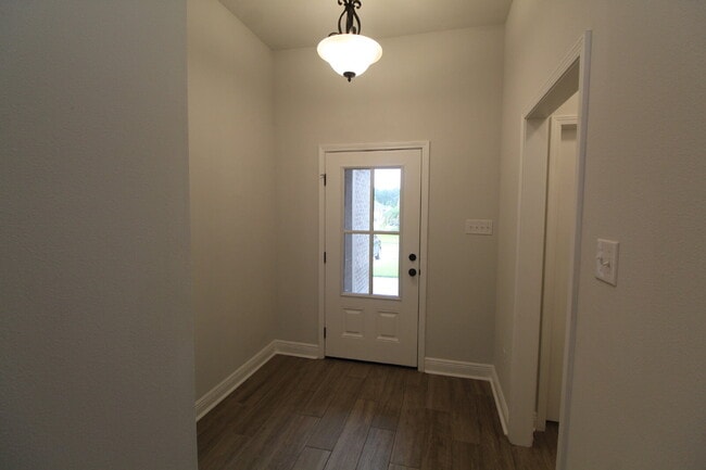 Photo - Sweetbarb Estates 3BR Home Near I-10 & Pine Forest Rd with Quartz Kitchen, Tile Floors, 2-Car Gar...