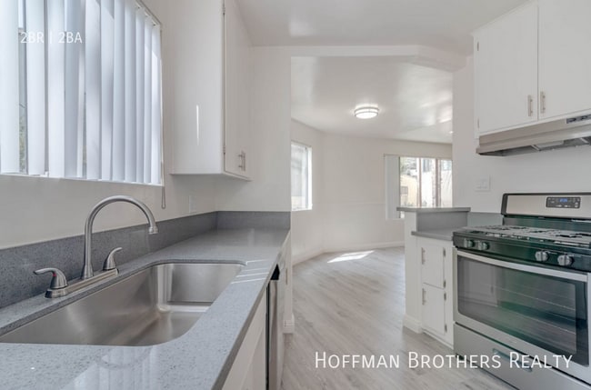 Building Photo - 8556 Cashio St Unit 8