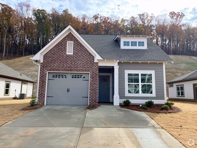 Building Photo - One level home with GARAGE and FENCED BACK...