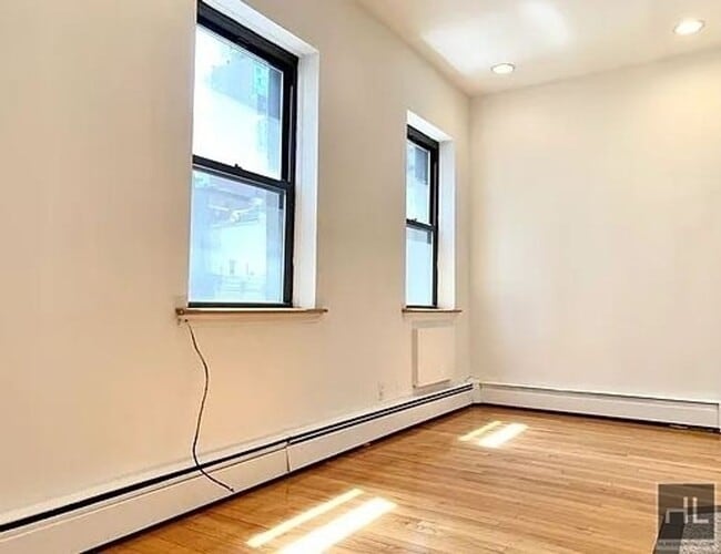 Building Photo - Beautiful Sunlit 1-Bedroom in the Heart of Midtown East