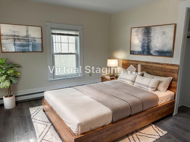 AI Staged Bedroom 1 - 1011 Massachusetts Ave Unit 3-room1