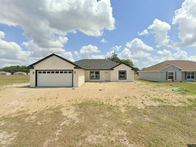 Building Photo - Stunning Brand-New 3BR/2BA Bushnell Block ...
