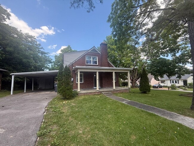 Photo - Spacious 4BR/2BA Two-Story Home with Basement, Hardwood Floors & Pet-Friendly Living