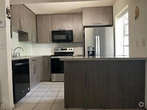 Building Photo - 9813 NW 3 St Rental