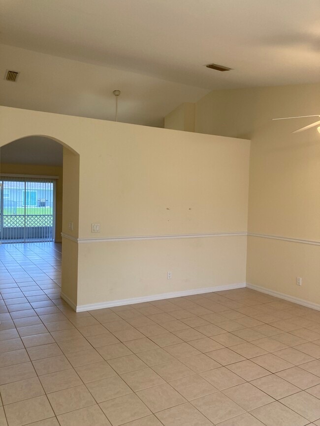 More living area with custom chair rail - 3224 SW 7th Pl Unit Duplex-3224 SW 7th Pl