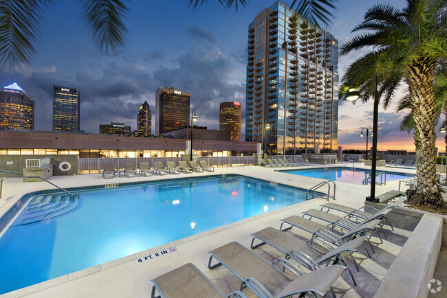 Pool deck with lounge chairs - Element Rental