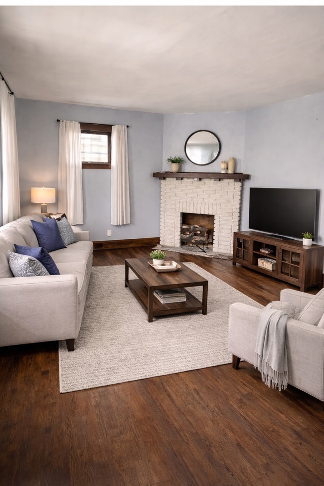 Living room w fake fireplace - 2041 Elbur Ave Unit Elbur Down