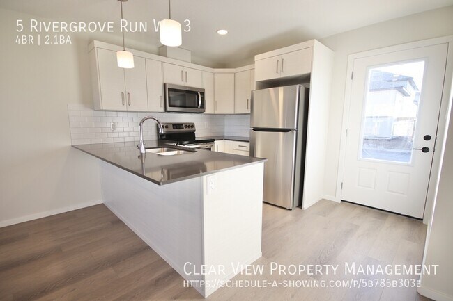 Photo - Riverstone 4 bedroom recently built townhouse!!