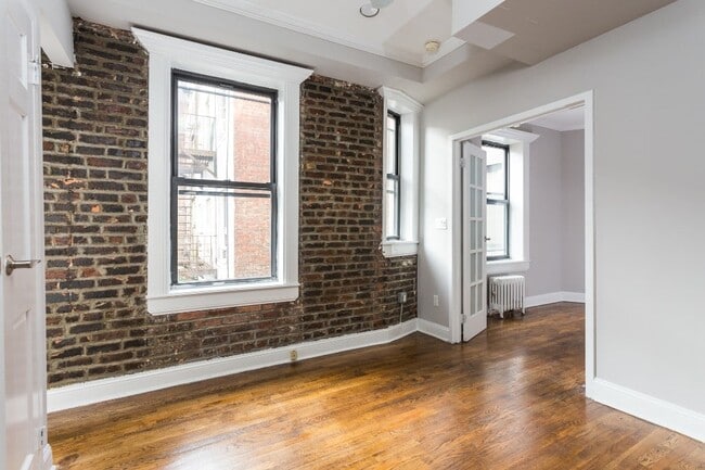 Building Photo - 432 E 13th St Unit 7