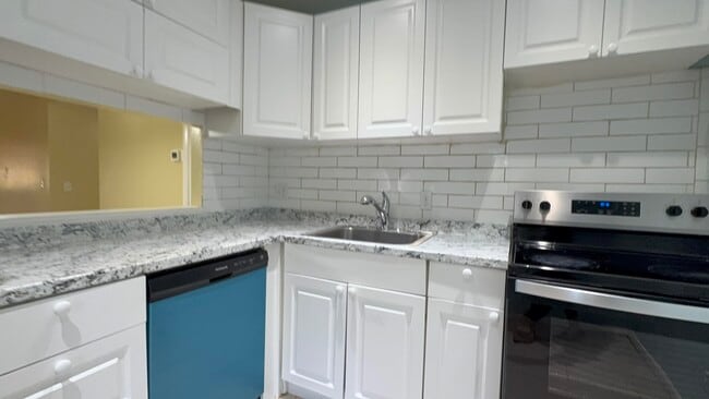 Building Photo - 12009 Poinciana Blvd Unit 202