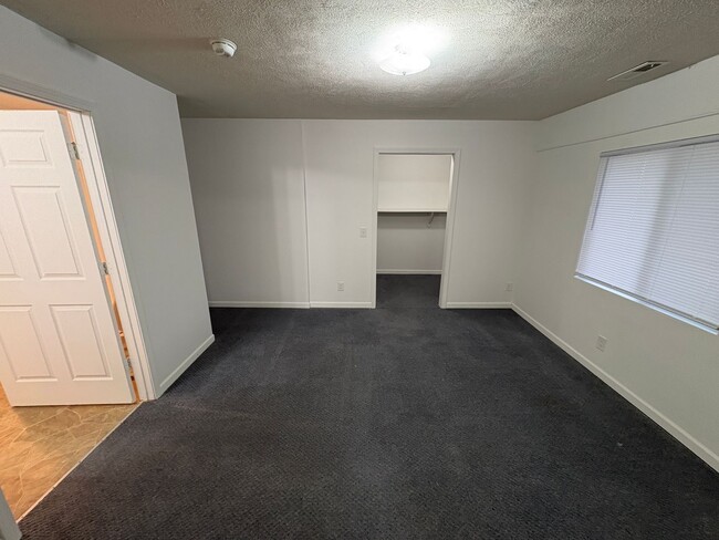 Photo - Lovely & Spacious 4-Bed, 2-Bath Single-Family Home Near Everything You Need