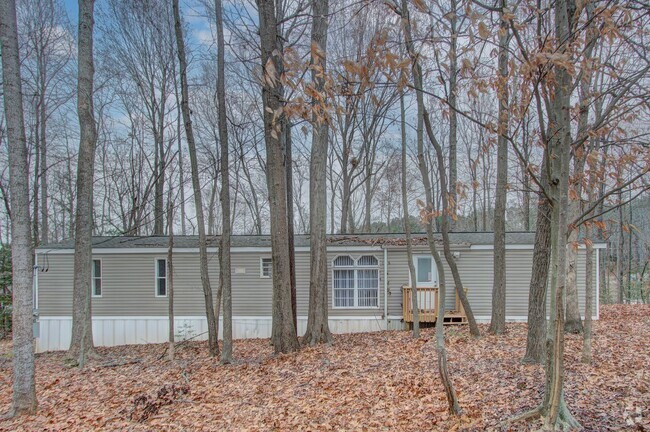 Building Photo - Nestled on a spacious, private wooded wate... Rental