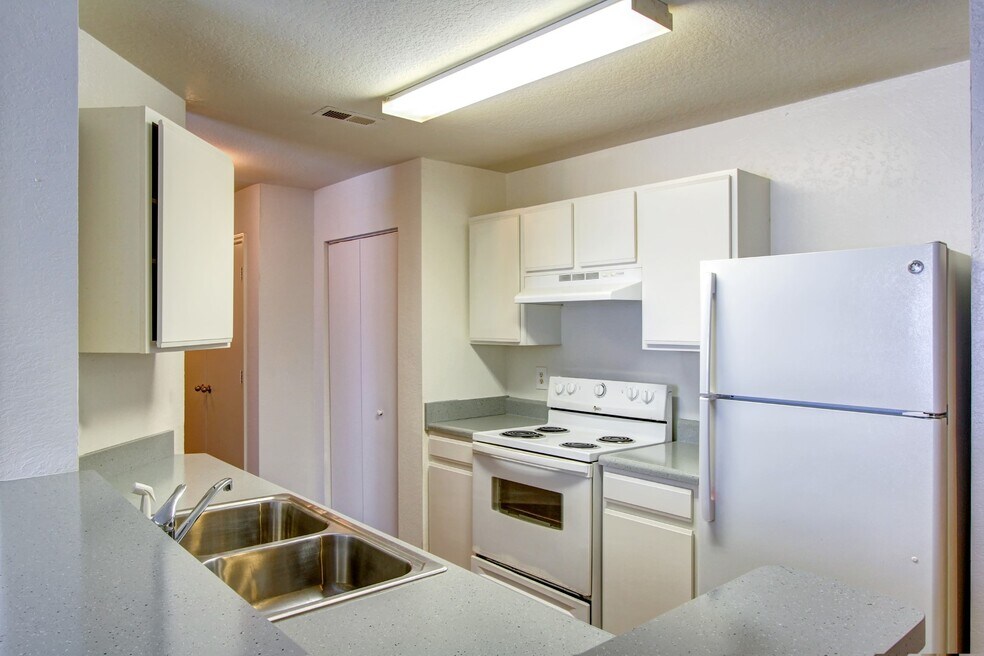 Fully-equipped kitchen with breakfast bar and pantry