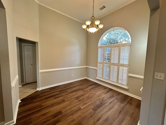 Photo - 4 bed 2 bath home with 2 car garage, covered patio, and fenced backyard