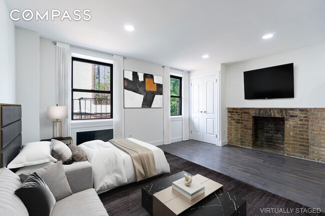 Photo - 400 E 9th St Apartment