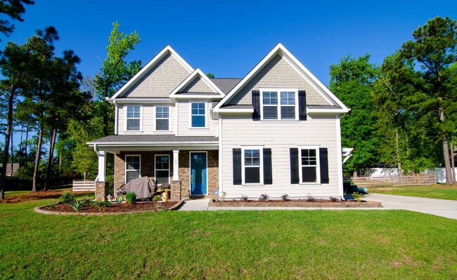 Building Photo - "Spacious 4-Bedroom Sanctuary with 3 Full Baths in Hampstead – Your Dream Home Awaits!"