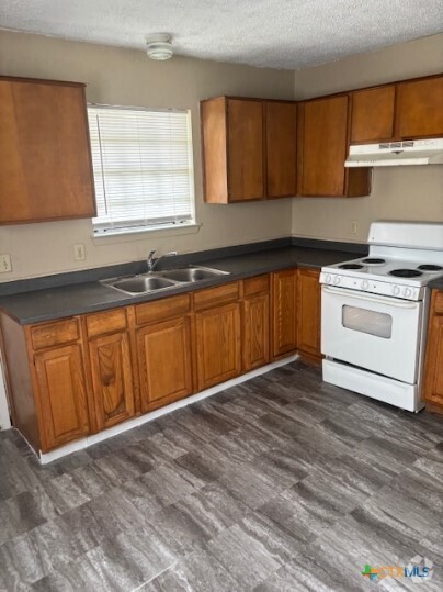 Building Photo - 104 E Washington Ave Unit A Rental
