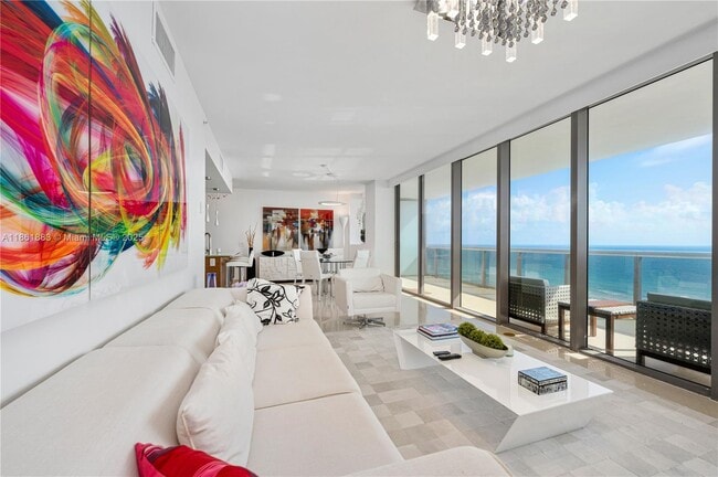 Building Photo - 5875 Collins Ave Unit 1202 Rental