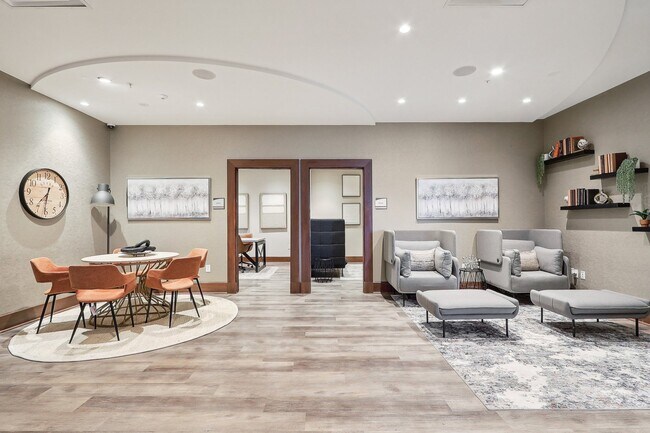 a room with couches and chair