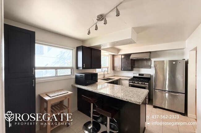 Photo - Spacious 3-Bedroom Main Floor Home in Scar... Unit 1