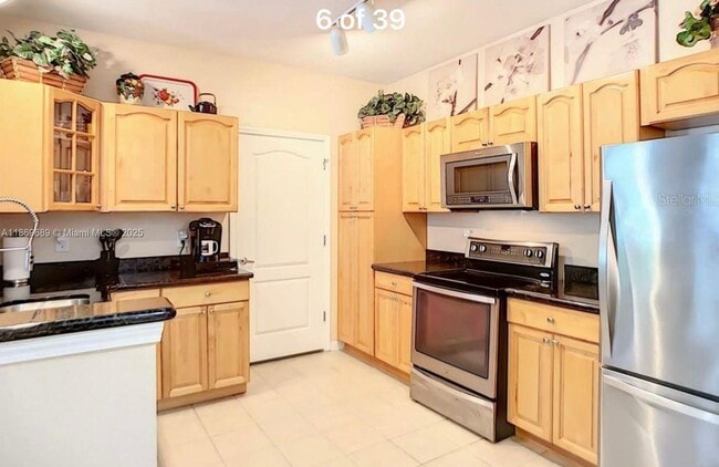 Building Photo - 5252 Cane Island Loop Unit 104 Rental