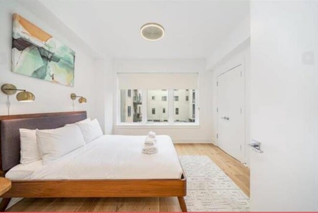 Building Photo - 1101 Grand St Unit 403