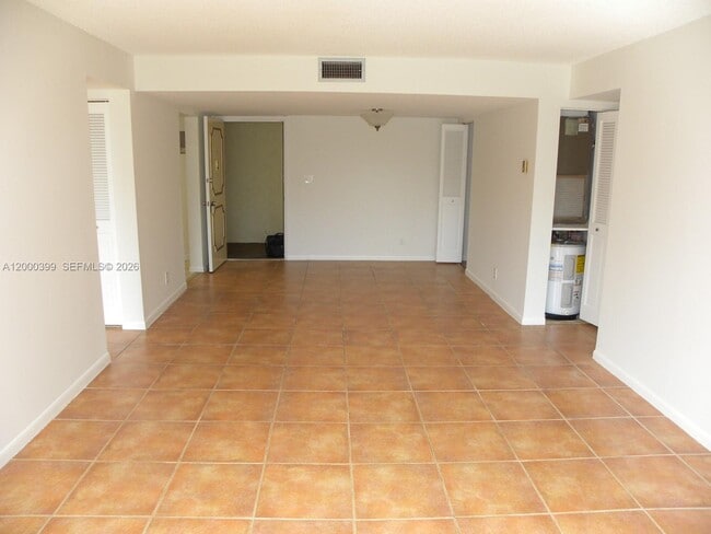 Building Photo - 8050 W McNab Rd Unit 206