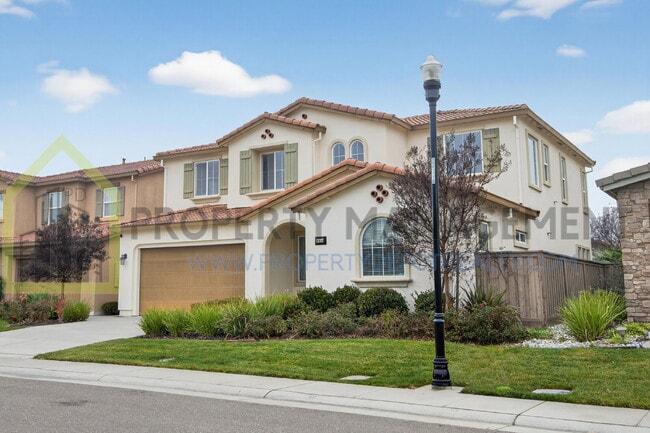 Photo - Spacious Elegance Awaits: 4-Bedroom Home with Hardwood Floors in Elk Grove!