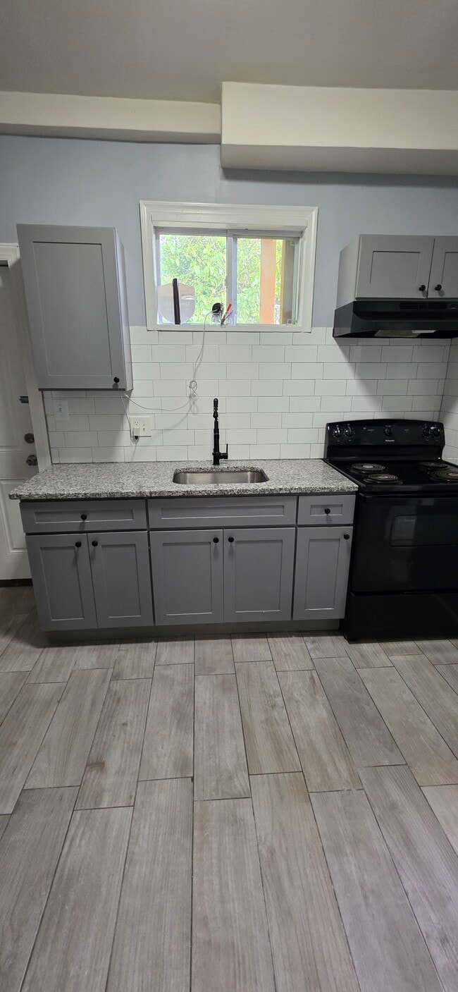 Building Photo - 3629 W Garrison Ave Unit Apt 1