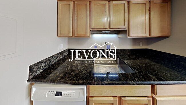 Photo - Coming soon! Charming top-floor condo with fully equipped kitchen - Water, sewer, and garbage inc...