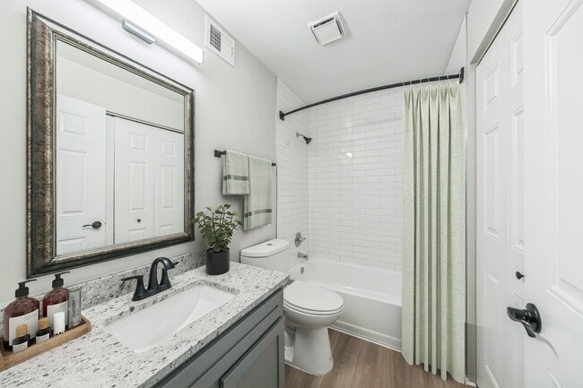 Elevate your living at Eagle Rock Apartments at Columbia, where modern design meets comfort. This stunning bathroom features elegant finishes and ample space for your relaxation needs. Schedule a visit today and envision your new home!