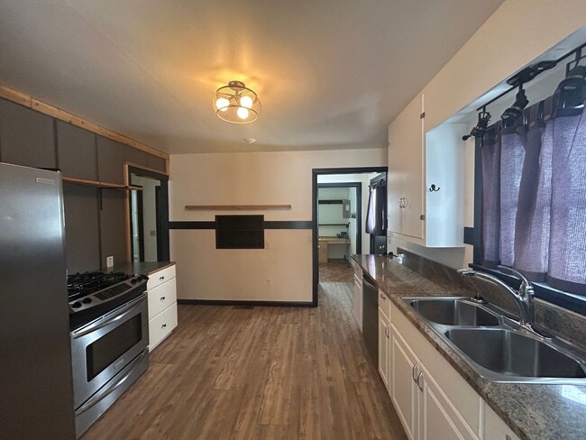 Photo - Bigfork Rodeo Farmhouse~ Fenced garden, greenhouse, garage, barn and shop!