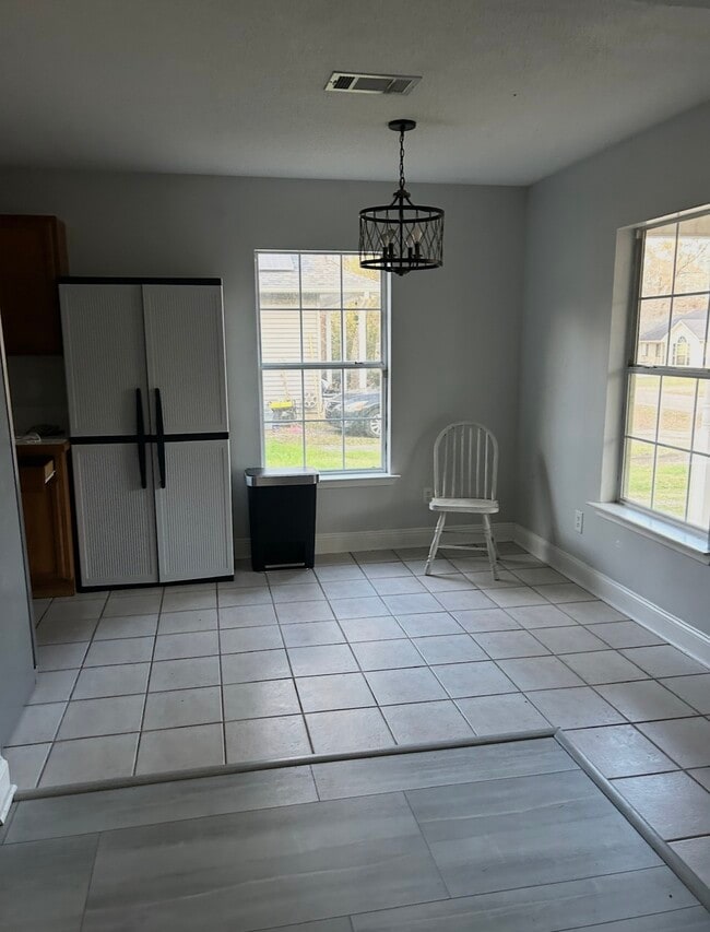 Dining area includes storage which may be removed