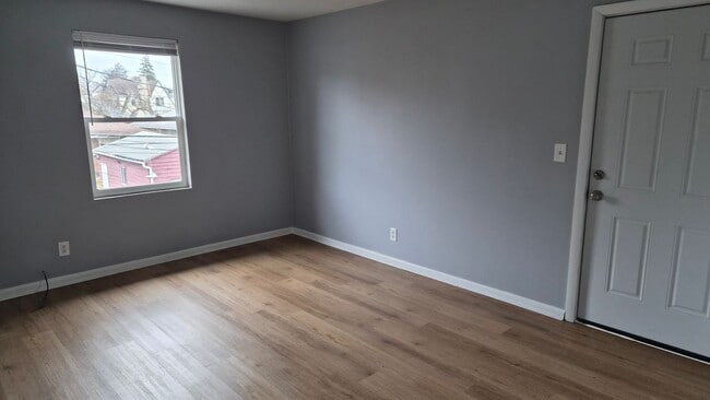 Building Photo - DRIVING PARK Unit F