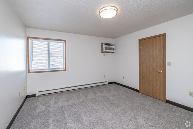3BR, 2BA - 1,160SF - Primary Bedroom