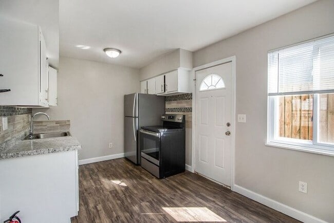 Photo - Lovely 2-Bed/1-Bath Townhouse – 850 sq. ft. of Modern Comfort - Ask about our security deposit al...