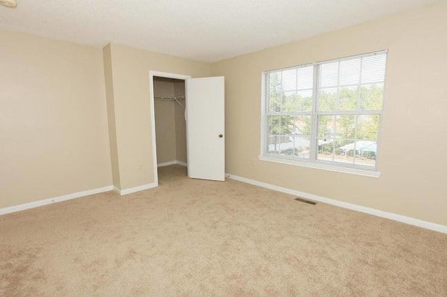 Bedroom with Carpeted Floors at Forest Ridge Apartment Homes in Ft. Mill, SC
