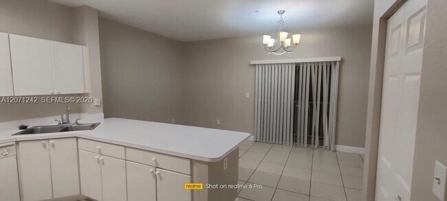 Photo - 6940 NW 179th St Unidad 404-7