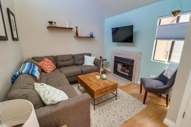 Photo - Stunning 2 bed 2 bath top floor condo in gated community with 2 covered parking spaces!